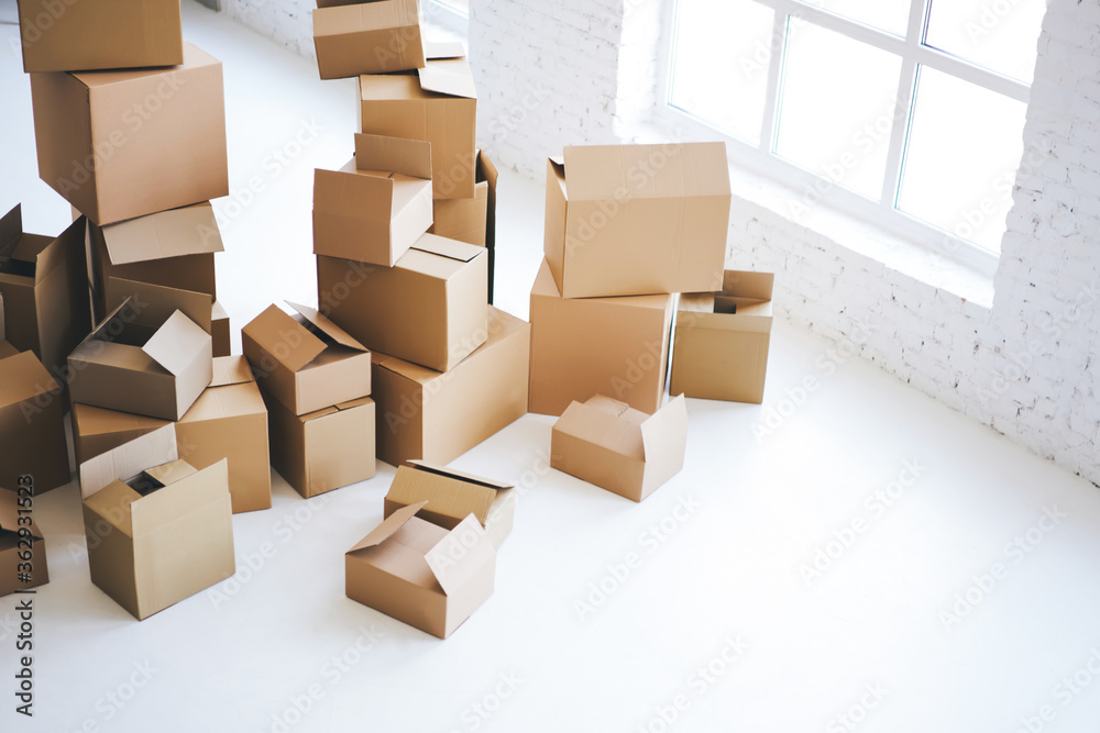 Brown boxes in white studio