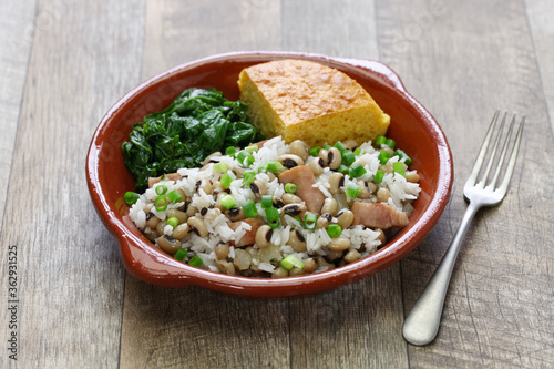 hoppin john: new year traditional food: black eyed pea and rice, cornbread and kale: southern food photo