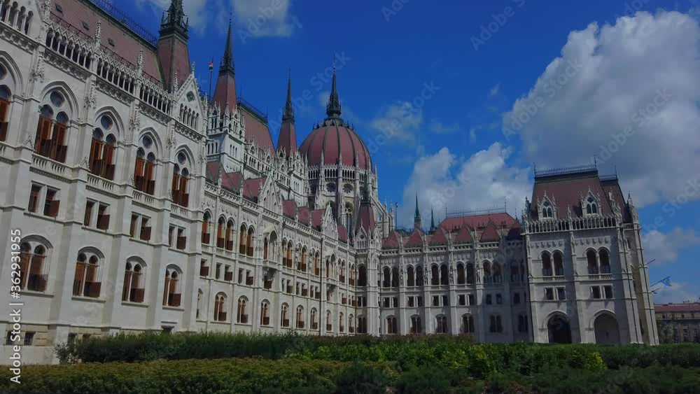 Amazing video about the hungarian parliament building. Clear blue sky with clouds. Fantastic touristic destination in Budapest Hungary. Amazing video about the hungarian parliament building. Clear blue sky with clouds. Fantastic touristic destination in Budapest Hungary.