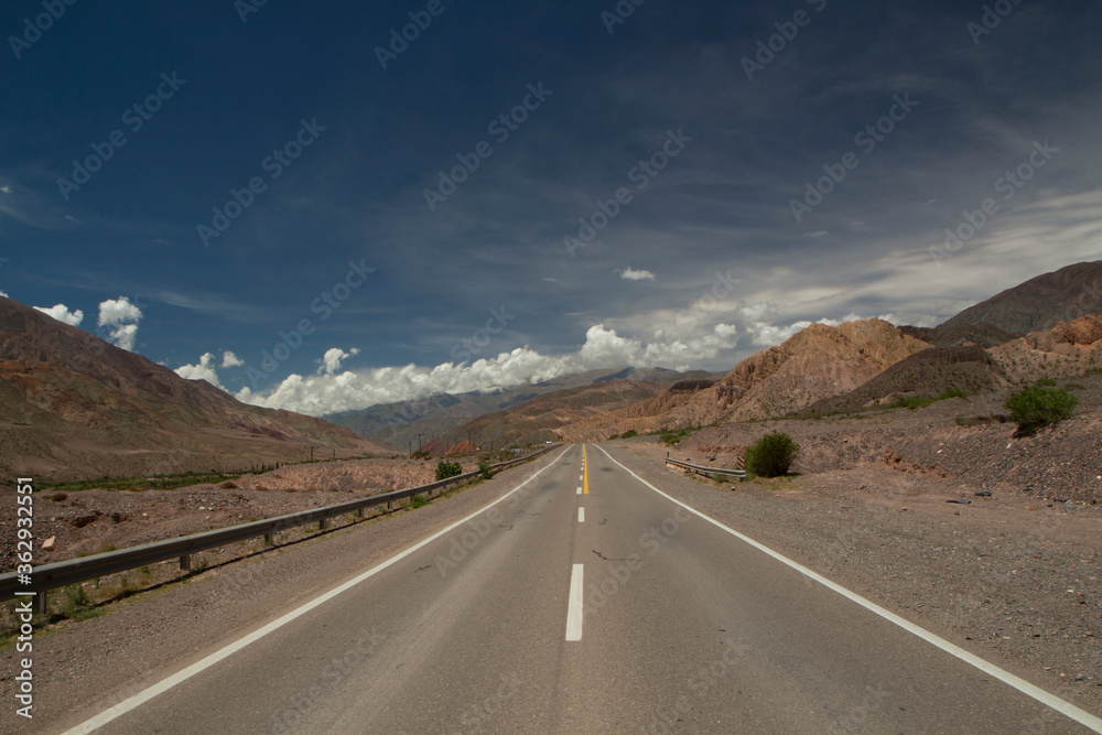 Transport. Traveling along the asphalt desert highway across the arid mountains. 