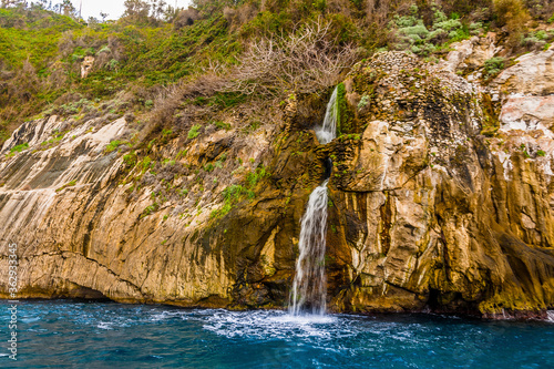A waterfall originating from ruins of a Roman aqueduct on the Sorrento Peninsula  Italy