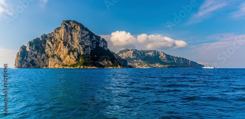 The steep cliffs of the Island of Capri  Italy on the horizon on a sunny morning