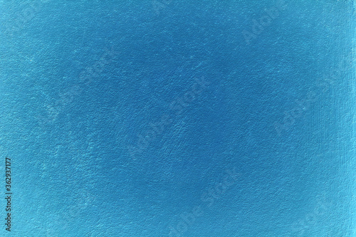 Light blue colored abstract background with fine texture.