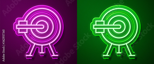 Glowing neon line Target with arrow icon isolated on purple and green background. Dart board sign. Archery board icon. Dartboard sign. Business goal concept. Vector.