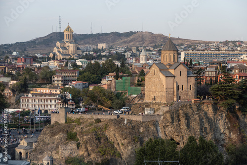 Tbilisi, Georgia, Metekhi St. Virgin Church and Holy Trinity Cathedral behind photo