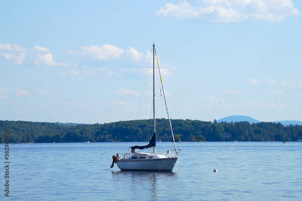 sailboat on blue water lake summer vacation sailboat on blue water lake summer vacation