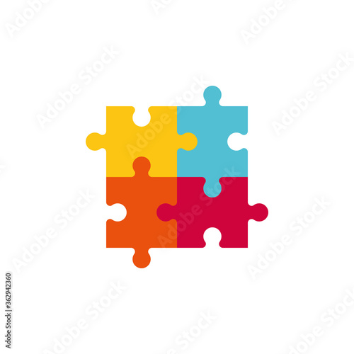Vector illustration of four colorful jigsaw puzzle pieces.