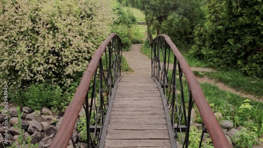 small decorative bridge in the garden small decorative bridge in the garden