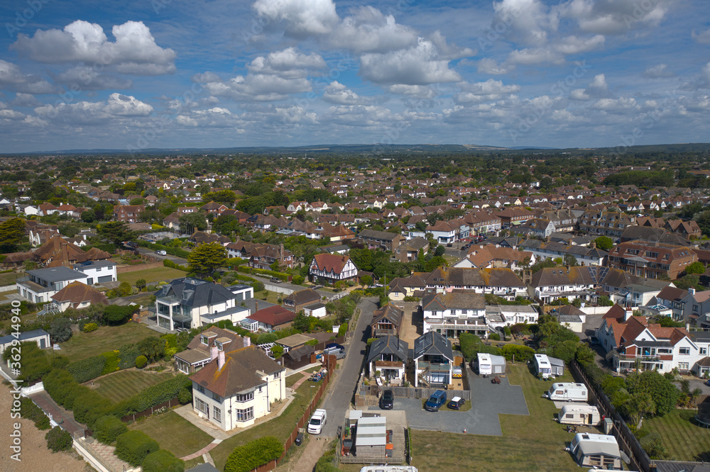 Aerial Photo of East Preston on the West Sussex coast looking from the beach towards the center of the village.