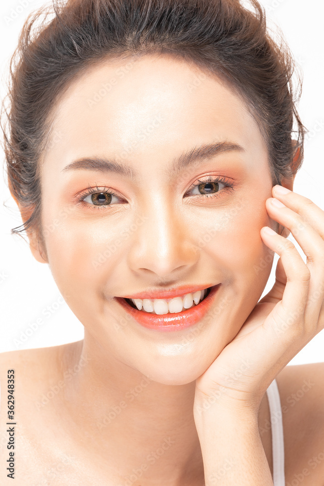 Beautiful Asian woman looking at camera smile with clean fresh skin Beautiful Asian woman looking at camera smile with clean fresh skin