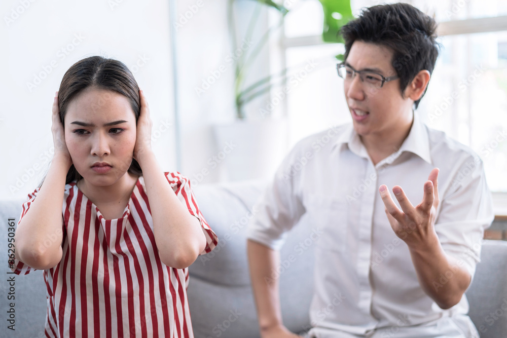 Fototapeta premium Asian lovers quarrel, Divorce problems, Unhappy couples and arguments at home.