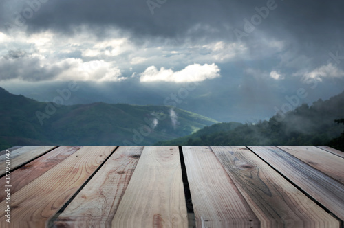 Wood floors and background images of landscapes, high mountains, tropical forests Editing for use
