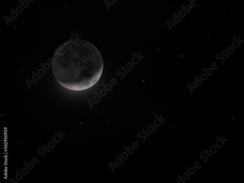 crescent moon in starry sky