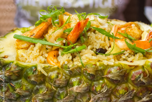 Thai rice with pineapple and shrimp, baked in pineapple. Close-up ready meal