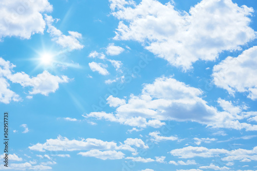Fototapeta Naklejka Na Ścianę i Meble -  blue sky with sun and clouds background