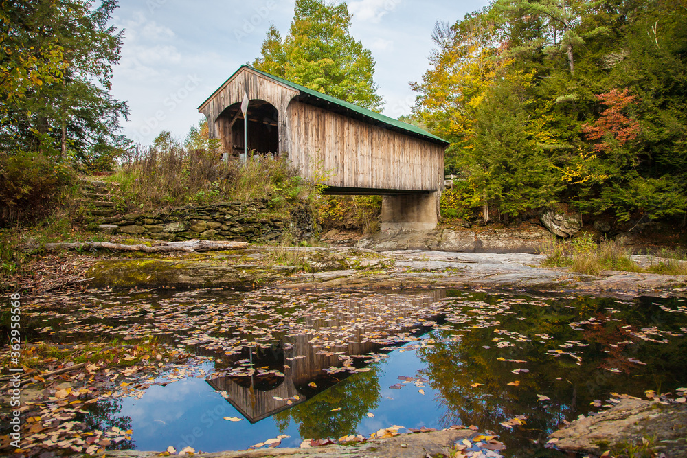 The Montgomery Covered Bridge, also known as the Lower Covered Bridge is a wooden covered bridge that carries Montgomery Road across the North Branch of the Lamoille River in Waterville, Vermont The Montgomery Covered Bridge, also known as the Lower Covered Bridge is a wooden covered bridge that carries Montgomery Road across the North Branch of the Lamoille River in Waterville, Vermont