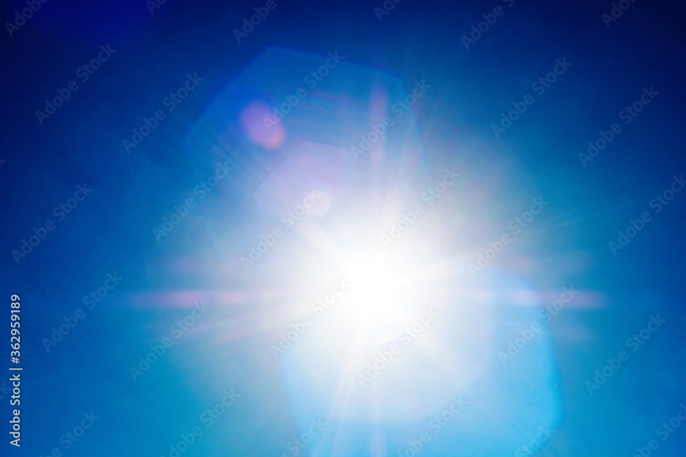 Shining sun at clear blue sky