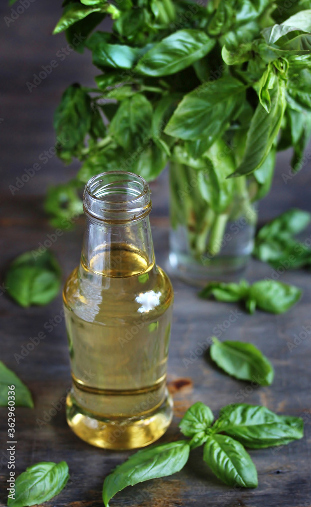 Basil Syrup on a dark background . Copy Space Basil Syrup on a dark background . Copy Space