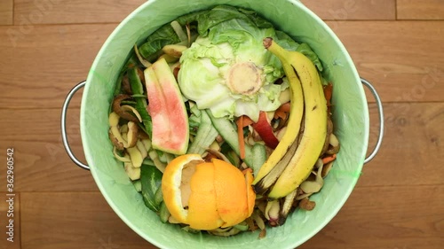 Bin full of organic waste, top view, time lapse