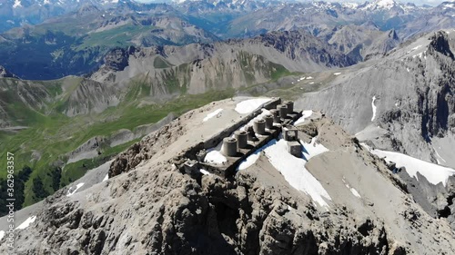 Mount Chaberton aerial view from airplane, peak of mountain in the Cottian Alps located in the French department of the Hautes-Alpes with forts battery on the top.