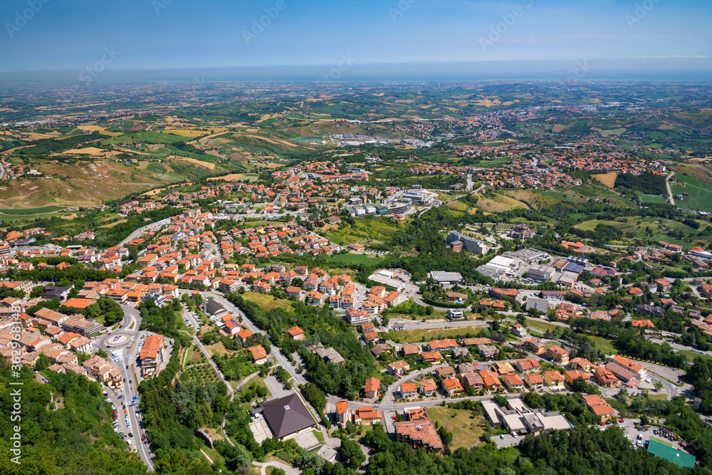 Aerial view of republic San Marino and Palm riviera, Italy, Europe.  San Marino landscape with Adriatic sea on the horizon. Amazing cityscape view from Monte Titano.