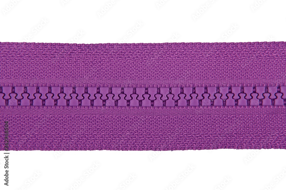 Closed purple zipper isolated on white background. Purple zipper for tailor sewing.