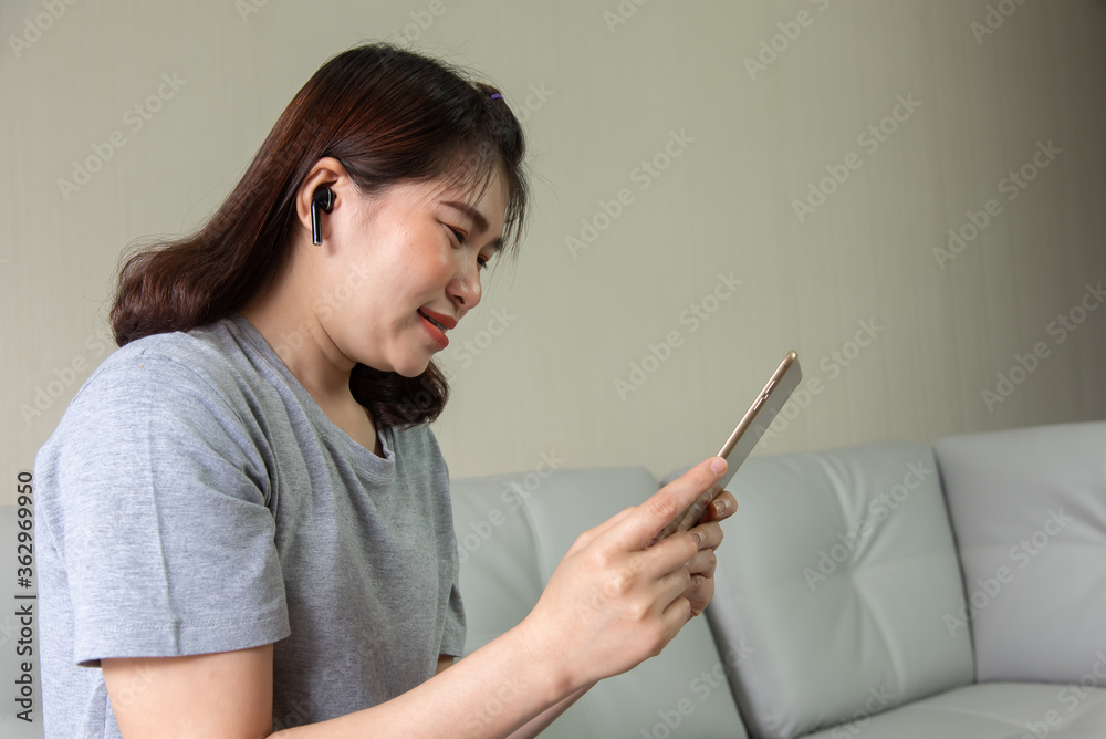 Young asian woman use mobile phone Call her friends or family Young asian woman use mobile phone Call her friends or family