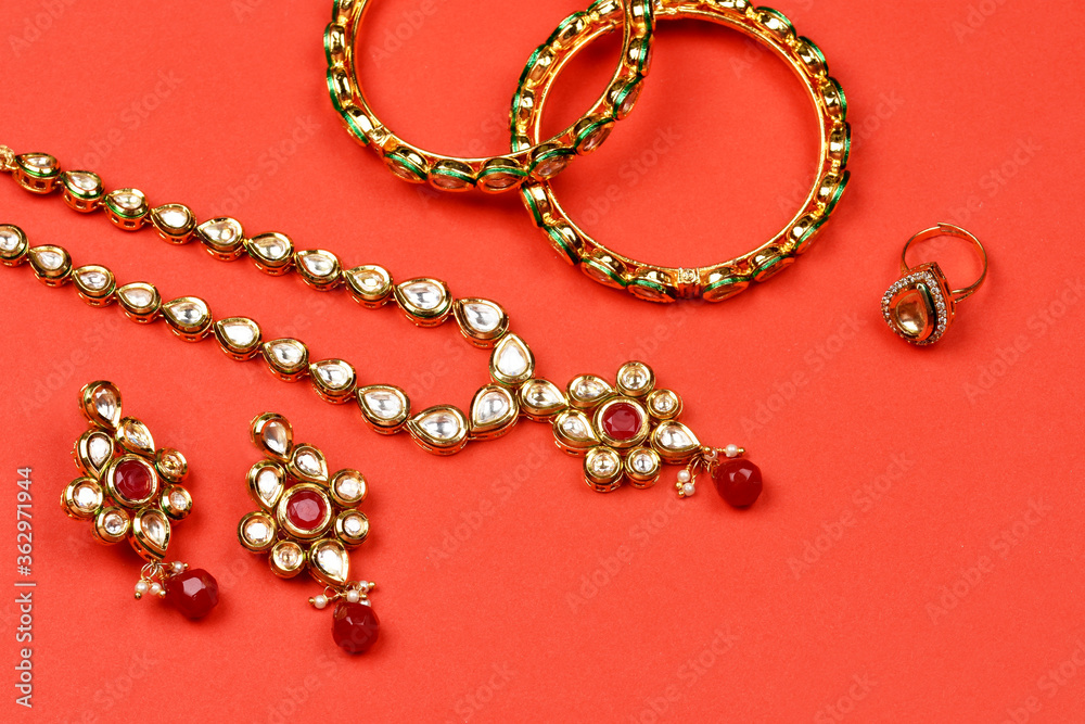 Indian jewellery accessories on background,kundan necklace set, Indian Traditional Gold Jewellery,Indian wedding jewellery, Indian jewellery accessories on background,kundan necklace set, Indian Traditional Gold Jewellery,Indian wedding jewellery,