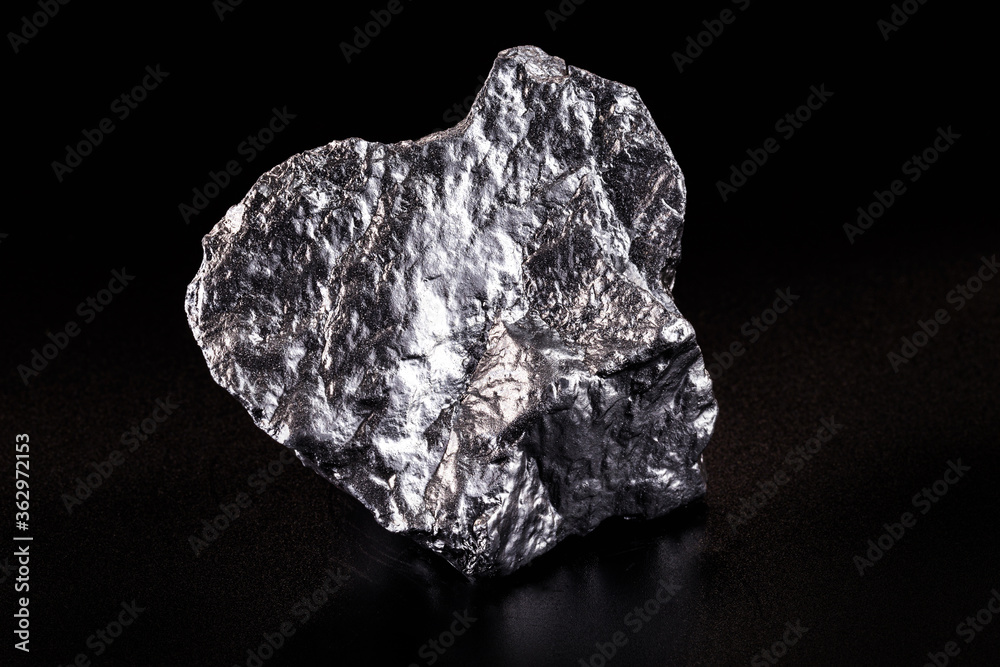 Chrome elemental specimen sample isolated on black background, mining and gemstone concept.