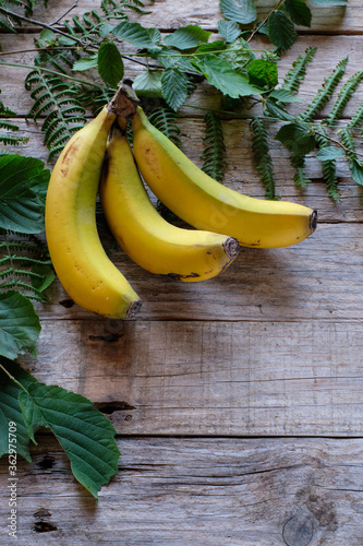 Bananas on rustic wooden table