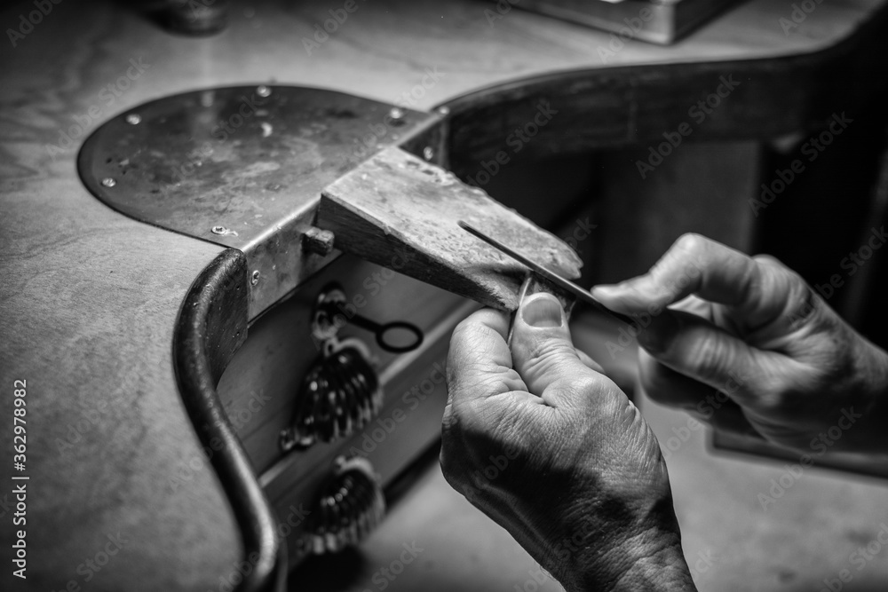 Hands of an artisan jeweler working jewelry. Jewelry Goldsmith