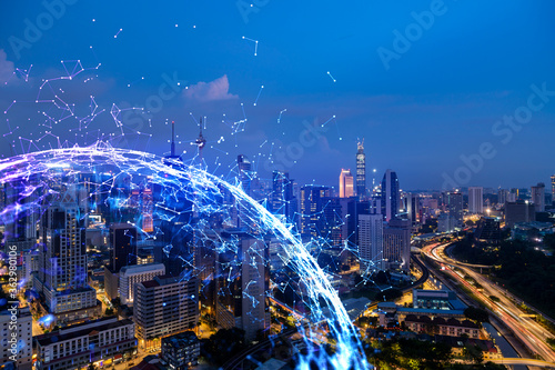 Photography Abstract technology icons, night aerial panoramic cityscape of Kuala Lumpur, Malaysia, Asia
