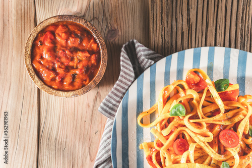 Pasta with tomato sauce and basil. Delicious tagliatelle. Italian tasty food