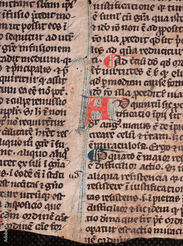 A manuscript on vellum of St Thomas Aquinas written in the twelfth or thirteenth century with rubricated red initials. 