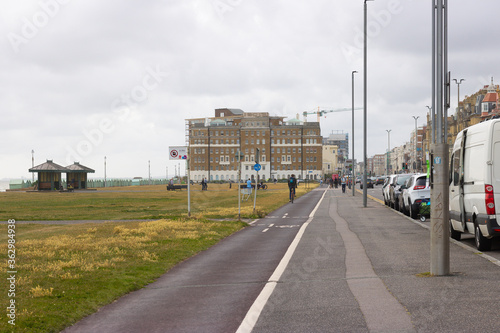 Urban Modern Landscape of Three Ways – Sidewalk for People, Lane for Cyclists and Road for Cars. Street View in Brighton, UK.