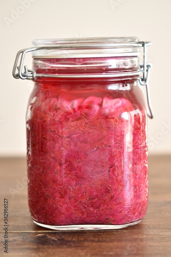 homemade red cabbage sauerkraut in glass container
