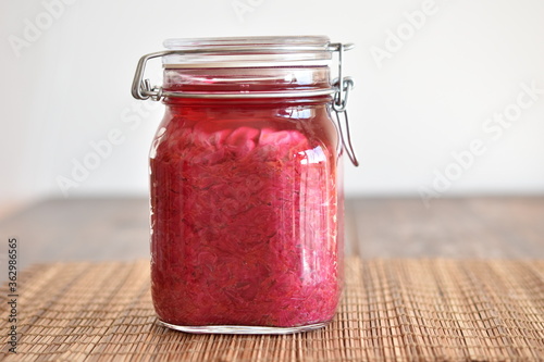 homemade red cabbage sauerkraut in glass container