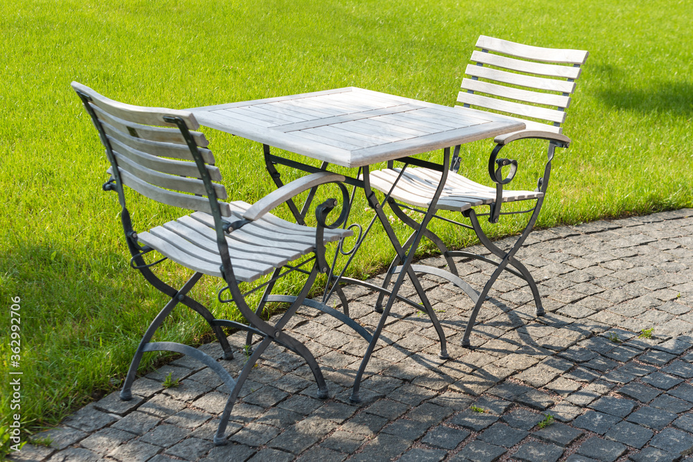 Outdoor cafe. Empty chairs in cafe or restaurant on summer day Outdoor cafe. Empty chairs in cafe or restaurant on summer day