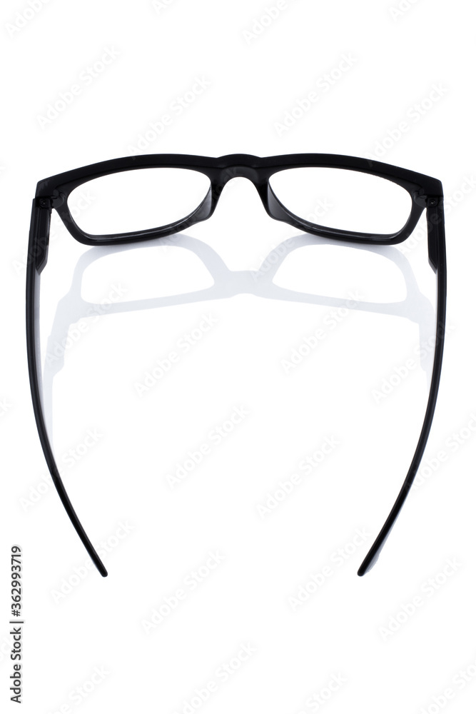 Black glasses with transparent lenses isolated on white background