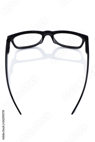 Obraz na płótnie Black glasses with transparent lenses isolated on white background w salonie