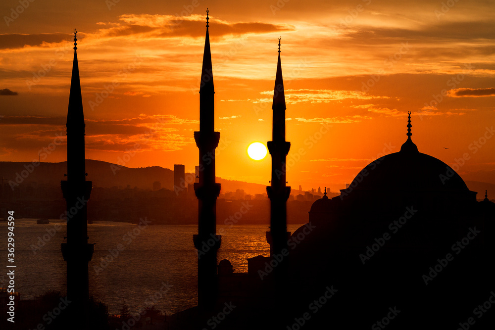Blue Mosque in silhouette at the sunrise, Istanbul, Turkey.