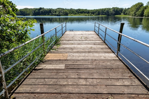 Wallpaper Mural jetty on a lake in the Mecklenburg Lake District, Germany Torontodigital.ca