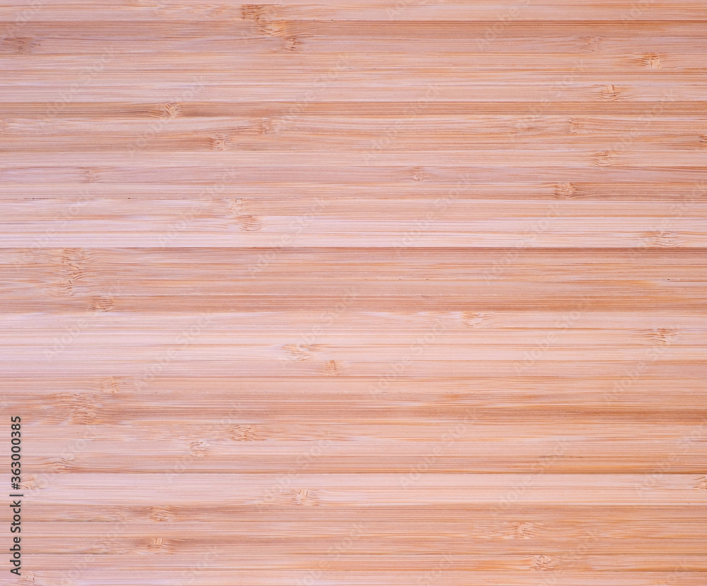 Naklejka premium Light yellow beige surface of wooden background board.