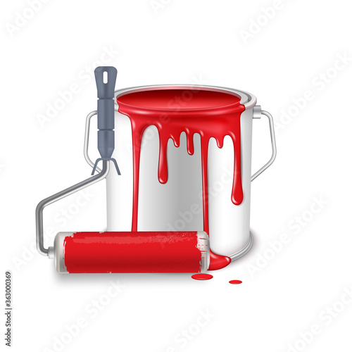 An open tin can with spilled red paint and a roller brush smeared in paint.