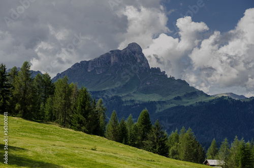 Armentara meadows with Sass de Putia mountain on the trail to La Val, Alta badia, Dolomites, South Tyrol, Italy.