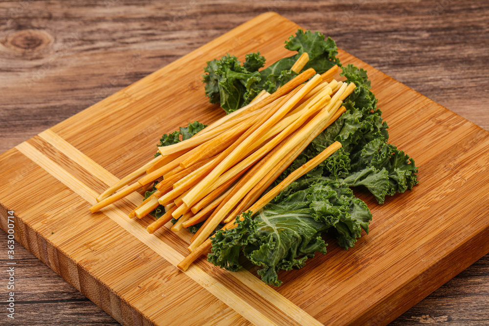 Chechel cheese sticks over board