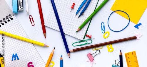 Many different school supplies on white background. Back to school concept.
