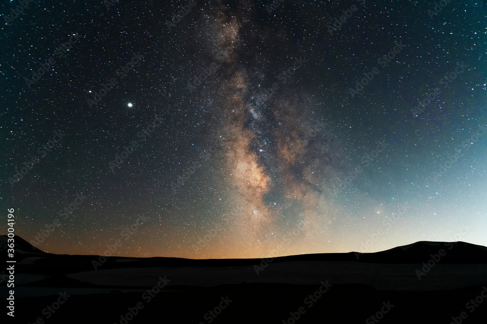 Beautiful starry sky with mountais silhouete, milky way galaxy. Night landscape. Astronomical background. Night photography. Beautiful starry sky with mountais silhouete, milky way galaxy. Night landscape. Astronomical background. Night photography.