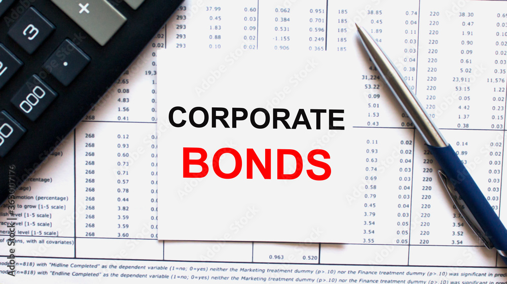 Work smarter text Corporate Bonds on white sheet with pen, calculator and tables Work smarter text Corporate Bonds on white sheet with pen, calculator and tables