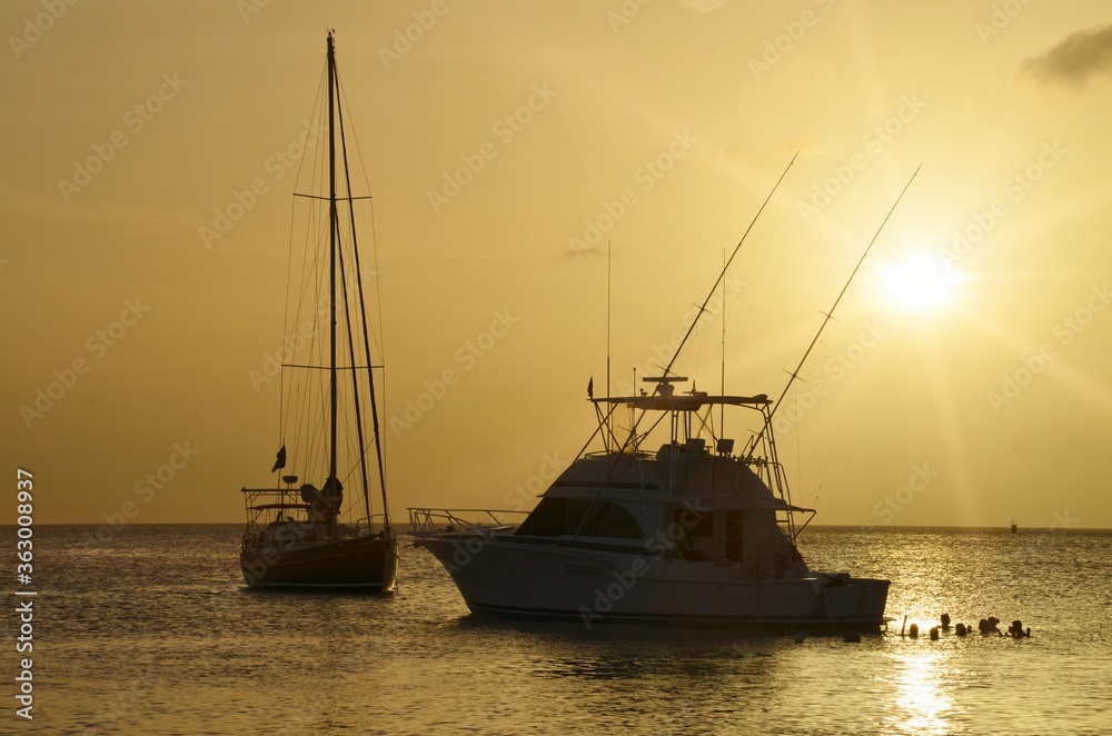 Yacht and sail boat in the Caribbean sea sunshine evening